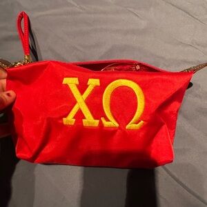 Red ChiO Cosmetic Bag Wristlet bag zipper and wrist strap. Great condition .